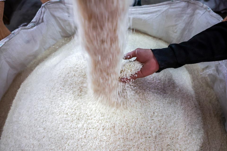 Milled rice is seen before being distributed to exporters at a rice mill, as Thai rice farmers face pressure following the imposition of tariffs, which are currently paused, by U.S. President Donald Trump, in Nakhon Pathom province, Thailand, April 18, 2025. REUTERS/Chalinee Thirasupa