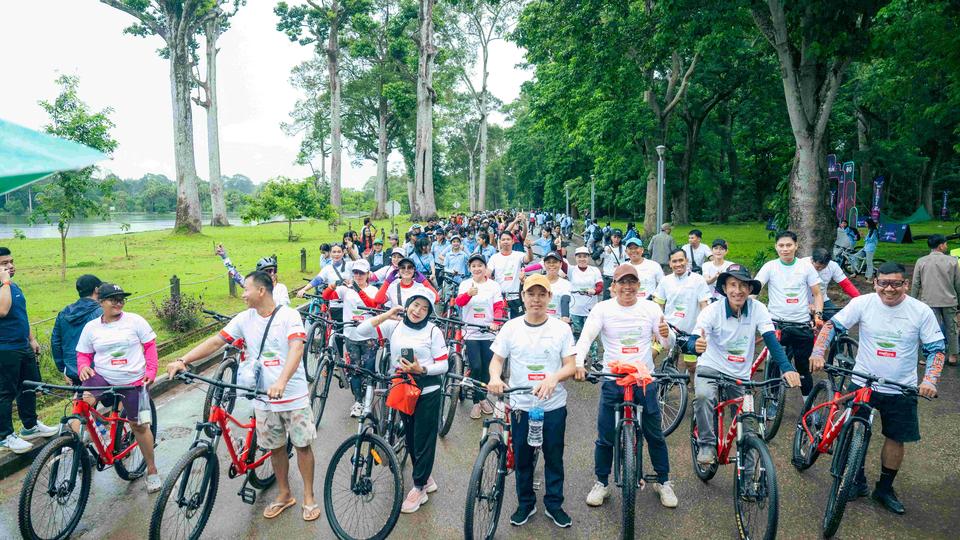 A cycling tour around the Angkor complex and planted trees to help protect the environment and preserve green spaces in the heritage site. Kiripost/supplied