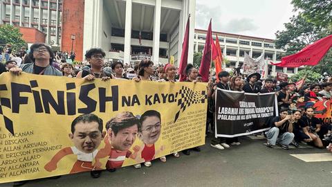 Hundreds of students at the University of the Philippines walk out of their classes and protest against corruption in government projects in Manila, Philippines, Friday, Sept.12, 2025. (AP Photo/Joeal Calupitan, File)