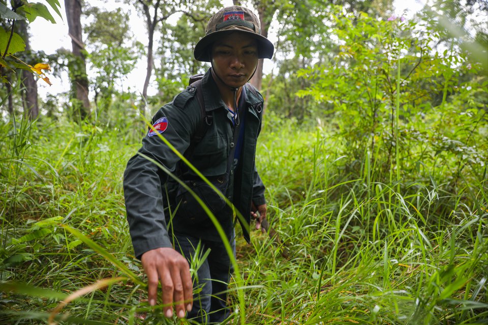 Chhoun Phirum, a former poacher and now a community ranger in Cambodia’s Phnom Tnout Wildlife Sanctuary conducts a patrol within the landscape’s core area. Photos by Anton L. Delgado for Southeast Asia Globe