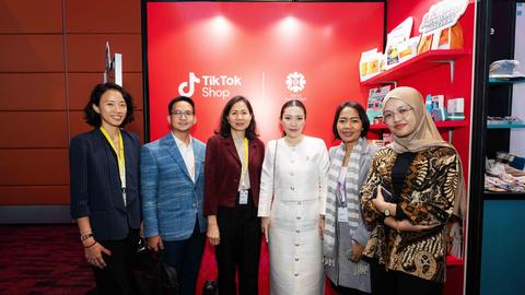 (From left) Candera Chan, Southeast Asia Public Policy at ByteDance; Ithikorn Tritasavit, Public Policy Manager for TikTok Thailand, Cambodia, Laos and Myanmar; Eng Netra, Director of the Cambodia Development Resource Institute; Chanida Klyphun, Director of Public Policy at ByteDance; Eng Saloth, Owner of Camb-Aha; and Queentara Alysha, Project Officer at ASEAN SOAR Together, pose in front of the ASEAN SOAR Together x TikTok Shop booth during the ASEAN Business and Investment Summit 2025.
