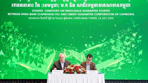 Credit Guarantee Corporation of Cambodia (CGCC) and Wing Bank (Cambodia) Plc sign a $50 million Wholesale Guarantee Scheme (WGS). Kiripost/supplied