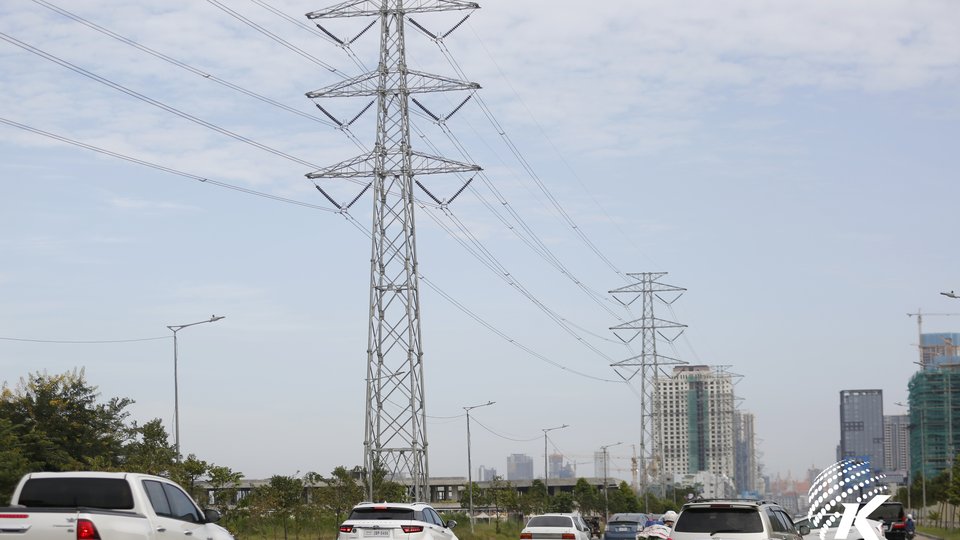 Electric poles along a street in Cambodia. Kiripost/Siv Channa