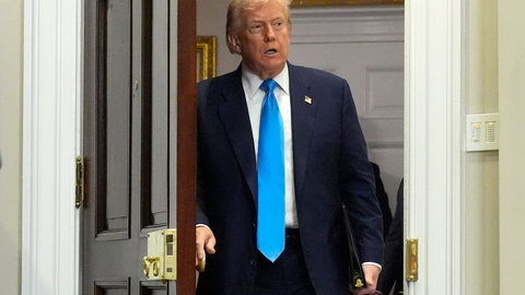 President Donald Trump arrives to sign the VA Home Loan Program Reform Act into law in the Roosevelt Room at the White House, Wednesday, July 30, 2025, in Washington. (AP Photo/Mark Schiefelbein)