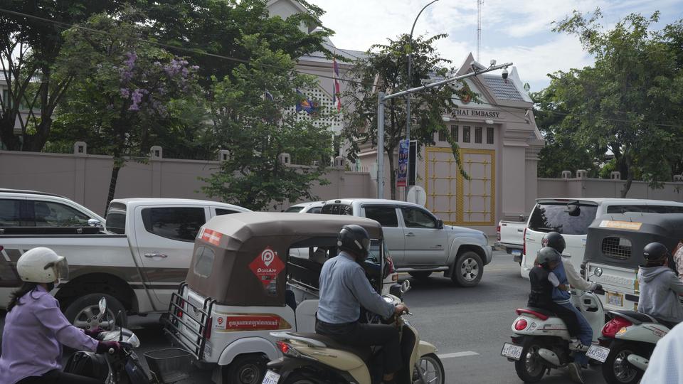 Local vehicles pass the Thai Embassy in Phnom Penh, Cambodia, Thursday, July 24, 2025. (AP Photo/Heng Sinith)